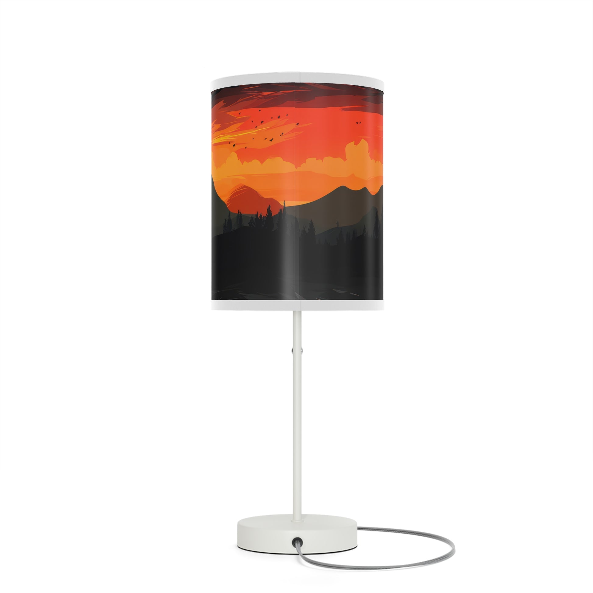 Sunset Silhouette - Lamp captures indoor sunset magic. With a realistic print of mountains and sunset, it bathes rooms in inviting hues. Radiant yet calming, its soft glow mimics natural sunsets, perfect for winding down. The lamp's 20" × 7" size, solid white steel base, and versatile design make it a charming addition to side tables, work desks, or nightstands.