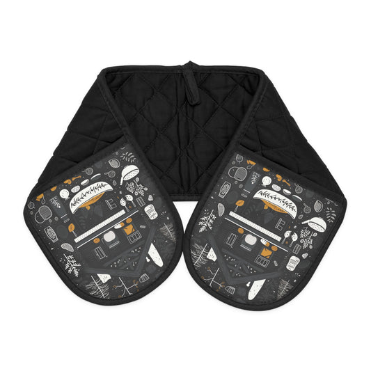 Cozy Cabin - Double Oven Mitt blends style and function. Its modern monochrome cabin-themed print in shades of black, grey, and yellow elevates kitchen décor. Made from 100% cotton, it ensures heat protection. Its slip-resistant design offers a firm grip on cookware. With slide-in pockets and a universal fit, it's both practical and chic. The hanging loop ensures easy storage, making it a must-have for contemporary kitchens.