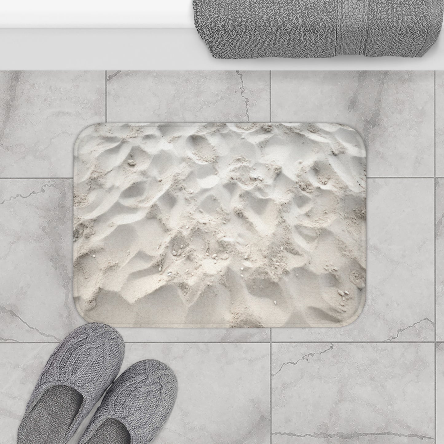 Transform your bathroom into a serene coastal retreat with Walking On Sand - Decor Bath Mat. The captivating white sand beach graphic, crafted from durable 100% microfiber, creates a tranquil haven. Its anti-slip backside ensures stability and the detailed binding guarantees long-lasting quality.